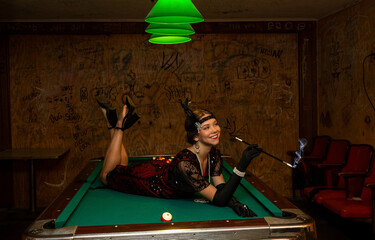 Roaring 20's flappers in basement speakeasy bar
