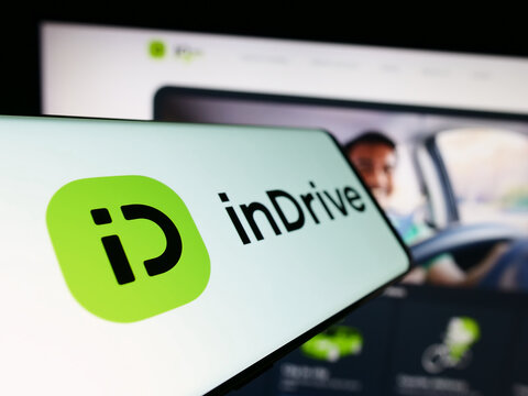 Stuttgart, Germany - 12-18-2023: Mobile phone with logo of American ride-hailing company Suol Innovations Ltd. (inDrive) in front of website. Focus on left of phone display.