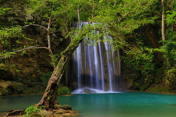 Erawan Waterfall is located in Erawan National Park. A 7-tiered waterfall for each level can go into the water. It is very famous, large and beautiful. 
Kanchanaburi province,Thailand