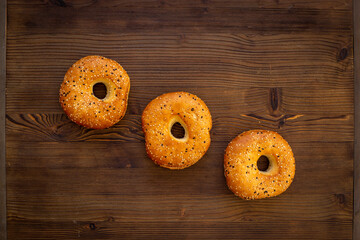 Set of fresh bread bagels, top view. Homemade baked bread