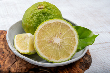Fresh ripe bergamot orange fruits, fragrant citrus used in earl grey tea, medicine and spa treatments