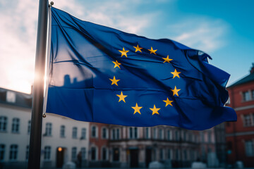 The flag of the European Union against the background of a cozy European city