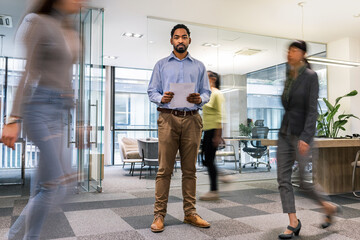 African American businessman standing in the office.