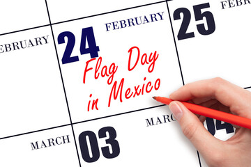February 24. Hand writing text Flag Day in Mexico on calendar date. Save the date.