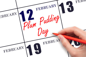 February 12. Hand writing text Plum Pudding Day on calendar date. Save the date.
