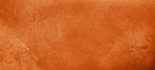 Orange textured concrete background