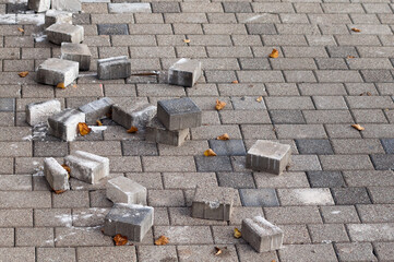 paving bricks, in the photo there is a sidewalk and paving bricks during repair work
