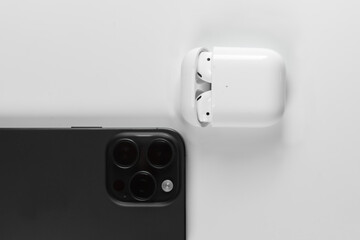 black modern smartphone with camera loss on white background