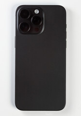 Iphone 15 pro max Black Titanium, iphone 12 pro max, black modern smartphone with camera loss on white background 