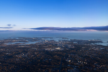 City of Helsinki and the Gulf of Finland from the plane window during takeoff