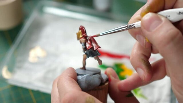 painting minis, miniatures for rpg game, roman soldier figurine
