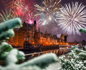 New Year fireworks display over the main town of Gdansk. Poland - obrazy, fototapety, plakaty