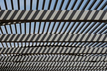 Psychedelic play of shadow and light on stone canopy