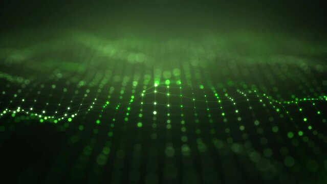 Abstract slow animation of small green dots changing size and color, connected in a network with tilt-shift effect, set against a dark background.
