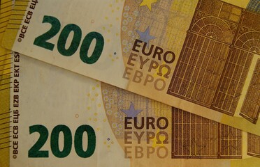 Large denomination euro banknote. 200 euros close-up. - obrazy, fototapety, plakaty