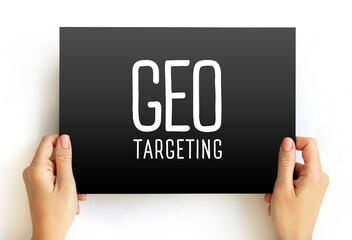 Geo Targeting - method of delivering different content to visitors based on their geolocation, text concept on card - obrazy, fototapety, plakaty