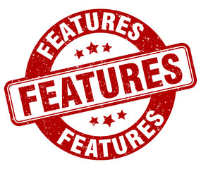 features stamp. features label. round grunge sign