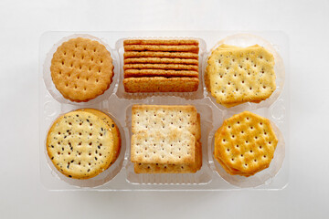 Overhead shot of assorted crackers on white