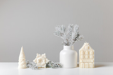 Christmas and New Year composition. Christmas fir tree branches, gifts, pine cones on wooden white...