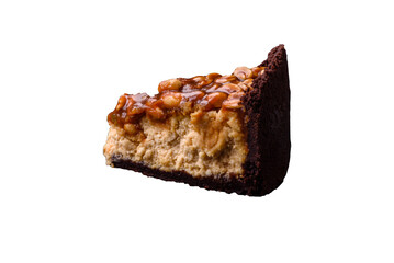 Delicious fresh cheesecake cake or snickers with cream and nuts