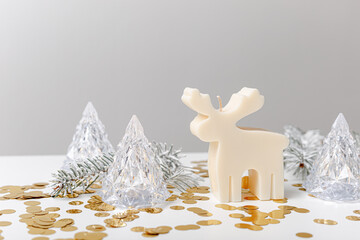 Christmas and New Year composition on a white background. Candle. Aroma spa concept. Winter...
