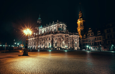 Fototapeta na wymiar night panorama of Dresden, Hofkirche church illuminated by lanterns
