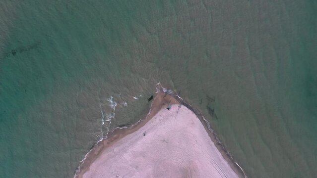 Aerial landscape panorama of Skagen Odde peninsula and Grenen - a meeting point of North and Baltic Sea (Skagerrak and Kattegat). North Jutland, Nordjylland, Denmark