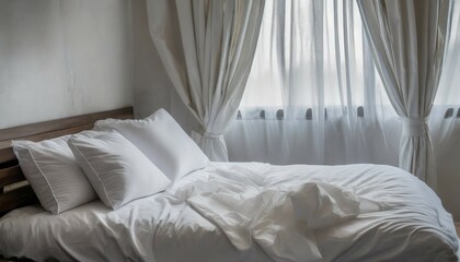 white bedding sheets and pillow background messy bed concept