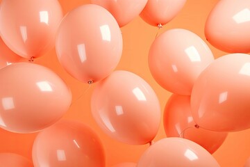 Balloons of delicate peach color on orange background