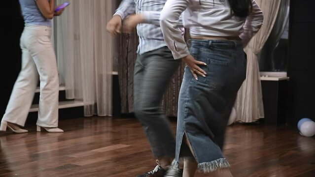 young woman and man dancing Latin American dances, salsa, bachata, kizomba, zouk, vcs
