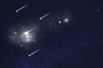 Shooting stars in dark sky at night