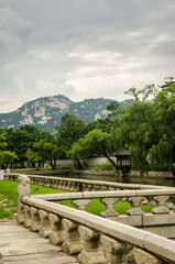 Fototapeta na wymiar Gyeongbokgung Palace during cloudy summer day.