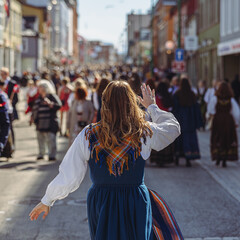 Woman waving in a traditional norwegian bunad dress