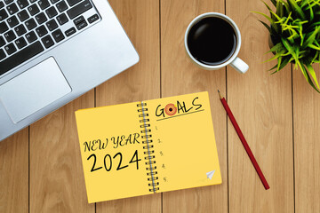 2024 Happy New Year Resolution Goal List and Plans Setting - Business office desk with notebook...