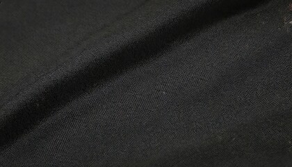 Fototapeta premium black flag cloth in full frame with selective focus 3d of pitch dark colored garment with clean natural linen texture for background banner or wallpaper use
