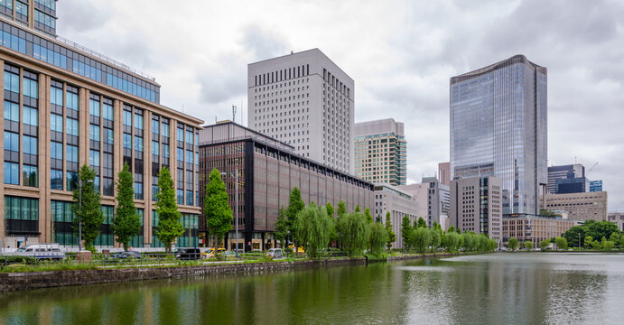 Skyscrapers of Marunouchi and Imperial Palace moat, Tokyo, Japan.