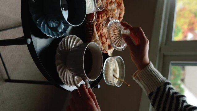 Aesthetic breakfast. Milk coffee, milk tea, sugar, almond, almond cakes, biscuits, marzipans and puffs. British breakfast in a cozy home. Autumn mood. Vertical video.