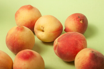 peaches on green background