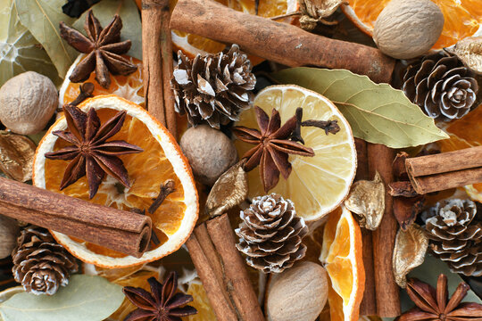 Winter holiday potpourri - mix of dried oranges, cinnamon stick, nutmeg, star anise, cloves, pine cones, bay leaves for a festive blend of scents