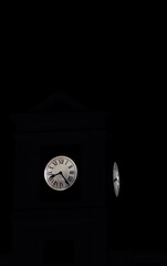 Puerta del Sol clock in Madrid with warm lighting at night