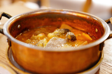 Very slow cooked stew of Bacalao (dried cod) confit in extra virgin olive oil	