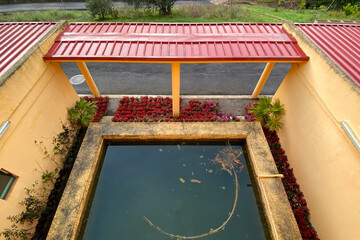 Exterior of a house with a swimming pool, view from above