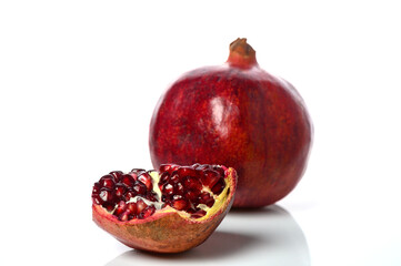 pomegranate and pomegranate slice on a white background 12