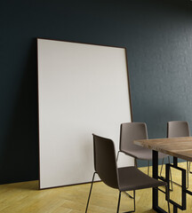 a massive frame mockup poster leaning on the blue concrete wall with dining table furniture interior