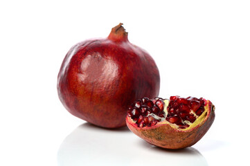 pomegranate and pomegranate slice on a white background 11