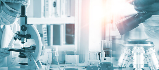 Double exposure microscope and Young woman scientific using equipment in the laboratory for research.Biotechnology,development,chemical,vaccine,Photo concept experimentation and research.