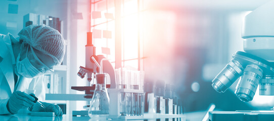 Double exposure microscope and Young woman scientific using equipment in the laboratory for research.Biotechnology,development,chemical,vaccine,Photo concept experimentation and research.