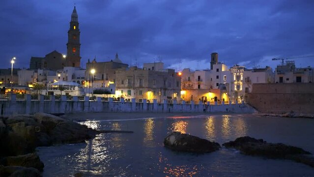 Monopoli traditional white city in the south of Italy in Puglia at sunset, in Italy