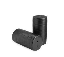 Black salt and pepper shakers isolated on white