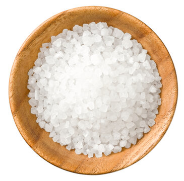 grain salt in the wooden bowl, isolated on white background, top view.